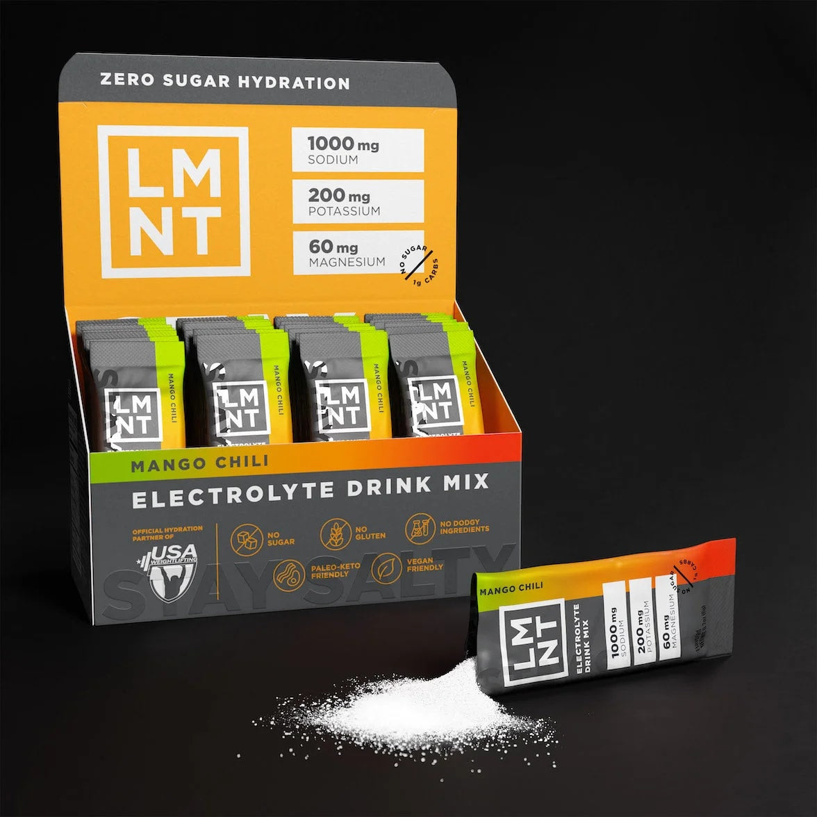 Open box of LMNT Mango Chili stick packs with one sachet beside a small pile of electrolyte powder.